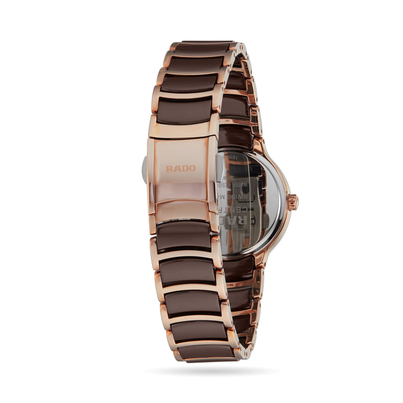 Back view of the Rado Centrix, a luxury timepiece featuring a two-tone rose gold and dark ceramic bracelet with visible clasp.
