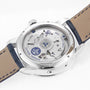 The back of the Ulysse Nardin Marine Torpilleur highlights its exposed mechanical movement through a transparent case back, displaying branding and technical details.