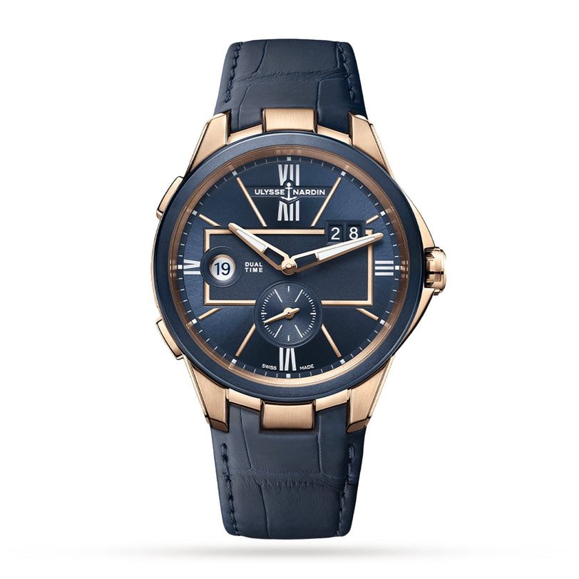The Ulysse Nardin Blast Dual Time is a gold and navy wristwatch with a blue alligator strap, dual time display, date window, and subdial on a white background.