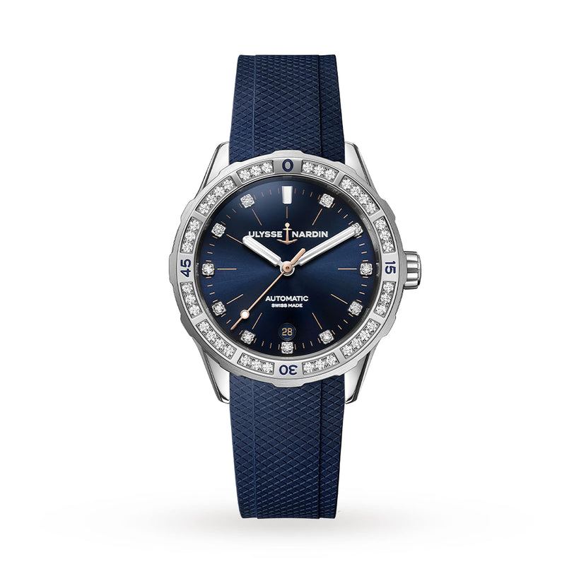 The Ulysse Nardin Diver 39 showcases luxury sports design with a blue textured strap, blue dial, silver-tone hands and markers, diamond-set bezel, and a date window at 6 o’clock.