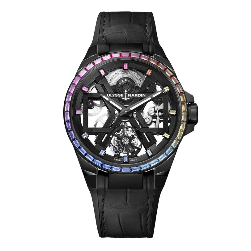 The Ulysse Nardin Blast Tourbillon Rainbow is a luxury wristwatch featuring a black case, skeleton X dial, multicolored gemstone bezel, and a black leather strap.