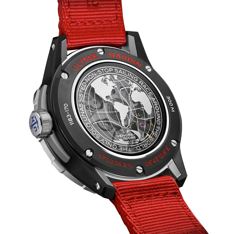 The Ulysse Nardin Diver NET Vendée Globe features a red strap and, on its caseback, displays a world map, round-the-world race route, and engraved coordinates—celebrating adventure in this sustainable watch.