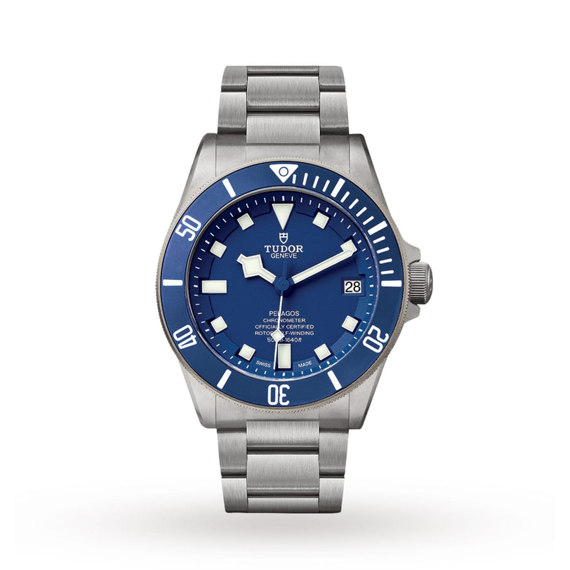 The TUDOR Pelagos is a Swiss Chronometer dive watch featuring a titanium case, blue dial, bold hour markers, unidirectional bezel, and a date window at 3 o’clock.