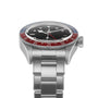 A TUDOR Black Bay GMT wristwatch in stainless steel with black dial, red and blue bezel, and metal bracelet, viewed from the front left—an iconic model inspired by classic diving watches.
