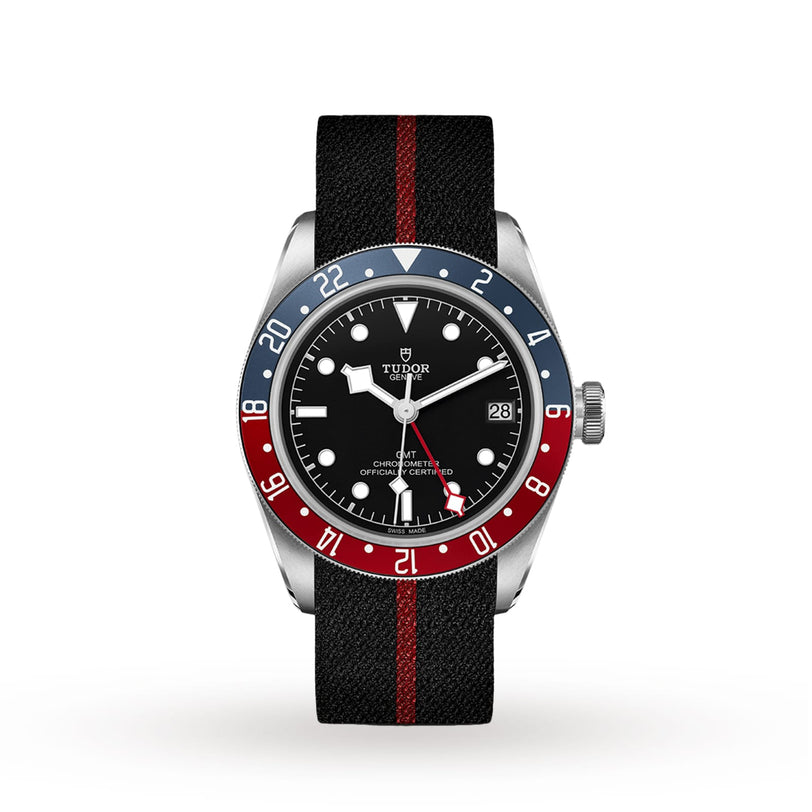 Inspired by the TUDOR Black Bay GMT, this watch features a black dial, blue and red bezel, black strap with red stripe, and date display at 3 o’clock—capturing the iconic style of TUDOR Heritage Black Bay diving watches.
