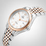 The TUDOR 1926 features a white textured dial, gold and silver stainless steel bracelet, rose gold bezel, date display, silver hour markers, and is powered by the precise mechanical caliber 2671 movement.