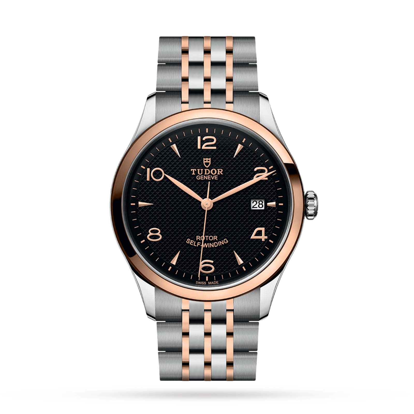 The TUDOR 1926 features a black textured dial, gold hour markers, date display, and a two-tone silver and gold bracelet—a refined timepiece blending timeless style with TUDOR’s renowned precision.