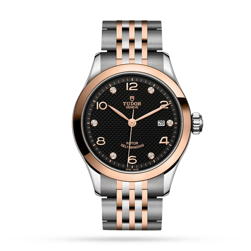 The TUDOR 1926 is a refined mechanical watch with a black textured dial, diamond hour markers, two-tone silver and rose gold bracelet, and date display at 3 o’clock—perfect for fans of timeless elegance.