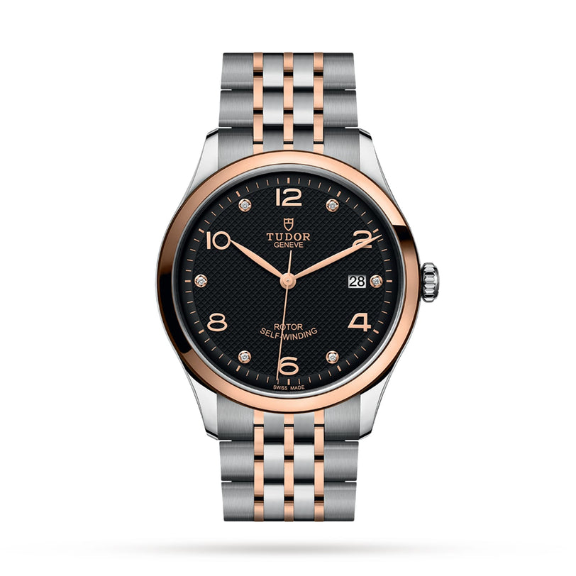 The TUDOR 1926 features a black textured dial, rose gold accents, a date window at 3 o’clock, and a two-tone stainless steel and rose gold bracelet—perfect for those seeking classic elegance.