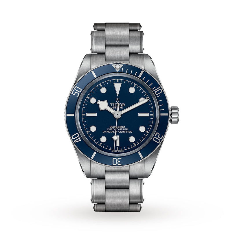 A TUDOR Black Bay 58 dive watch in stainless steel, featuring a blue bezel and dial, luminous markers, and a metal bracelet, shown against a white background.