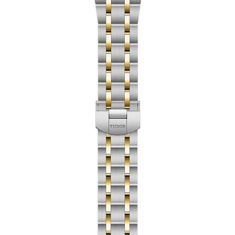A two-tone TUDOR Royal bracelet with alternating silver and gold links, featuring a clasp engraved with TUDOR—ideal for fans of the TUDOR brand and the UKs favorite Royal models.