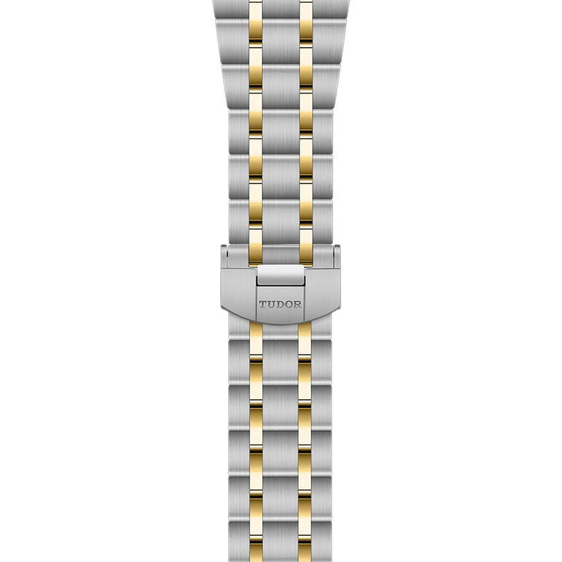 A TUDOR Royal two-tone silver and gold watch bracelet with a Tudor logo clasp, displayed vertically on a white background.