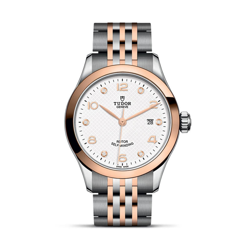 The TUDOR 1926 wristwatch features a white dial, date display, and a two-tone silver and rose gold bracelet and bezel—ideal for lovers of elegant timepieces.