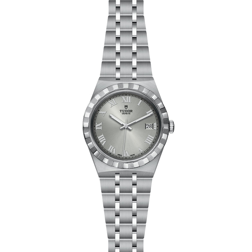 The TUDOR Royal is a stainless steel and gold wristwatch featuring a silver dial, Roman numeral hour markers, date window at 3 o’clock, and a five-link bracelet.