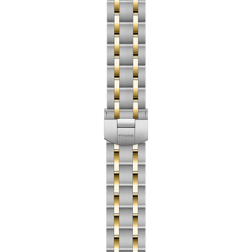 Stainless steel and yellow gold bracelet with folding clasp engraved with TUDOR, showcasing the signature style of the Royal collection.