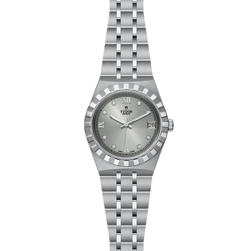 A TUDOR Royal wristwatch featuring a round face with Roman numeral and diamond hour markers, a date window at 3 o’clock, and a stainless steel and gold metal link bracelet.