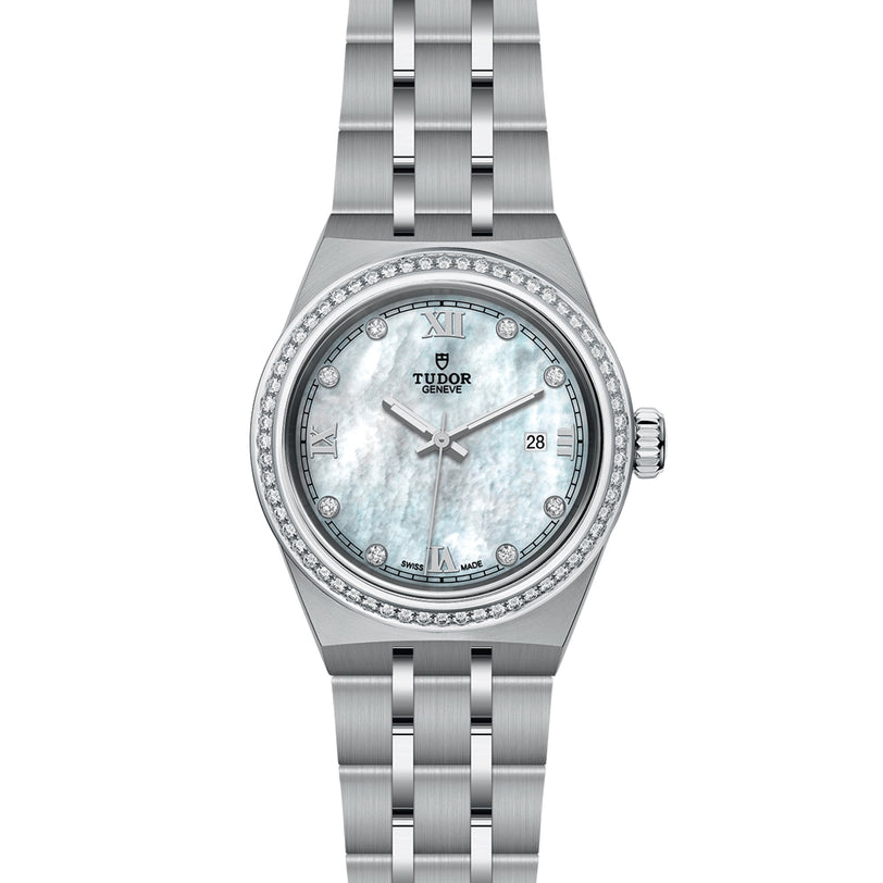 The TUDOR Royal is a silver wristwatch with a mother-of-pearl dial, diamond hour markers, Roman numerals, date display, and a diamond-set bezel on a metal link bracelet.