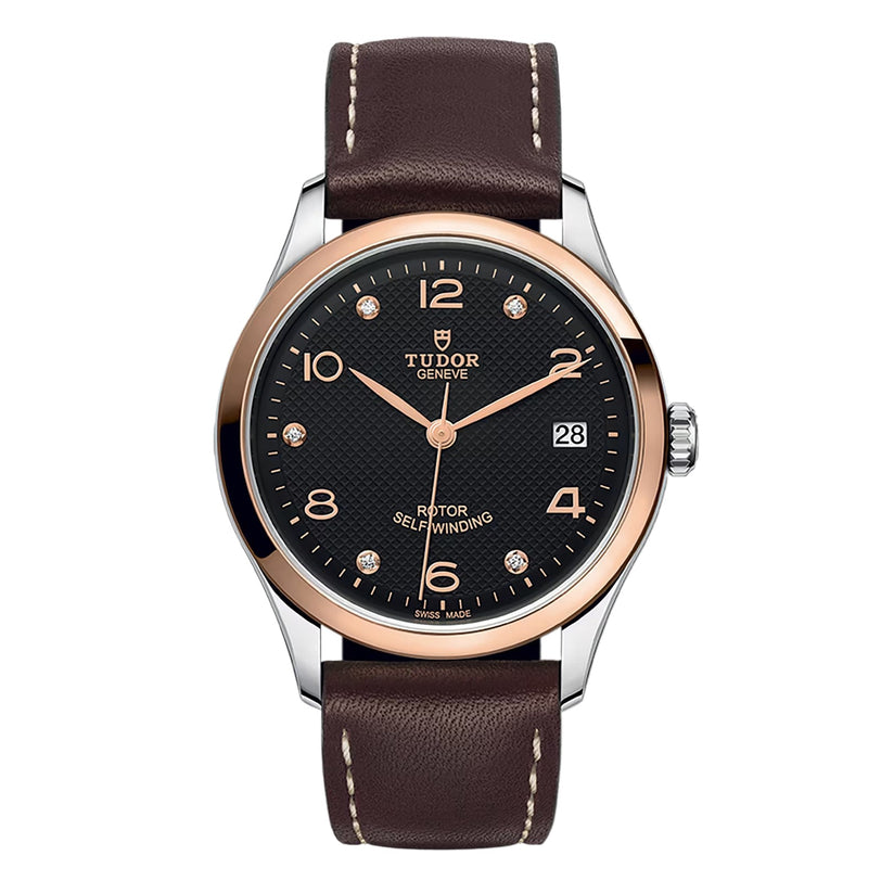 The TUDOR 1926 features a black dial, rose gold bezel, brown leather strap, date display at 3 oclock, and diamond hour markers—exemplifying the timeless elegance of mechanical watches.