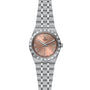 The TUDOR Royal wristwatch features a stainless steel case, salmon dial, Roman numerals, automatic movement, and a date window at 3 o’clock, shown from the front.
