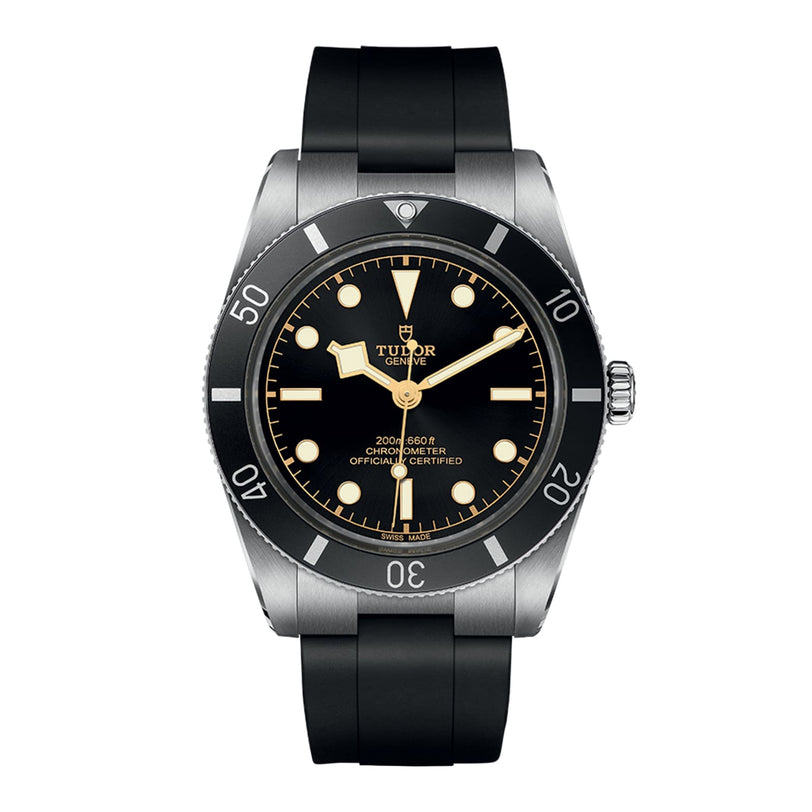 The TUDOR Black Bay 54 dive watch features a black bezel, black dial, rubber strap, luminous markers and hands, Tudor Geneve and chronometer details, and is powered by the Manufacture Calibre MT5400.