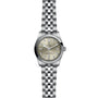 The TUDOR Black Bay One 31 wristwatch features a metal link band, light champagne dial, silver hour markers, and a date window at 3 o’clock; this unisex watch showcases refined watchmaking and is pictured from above on a white background.