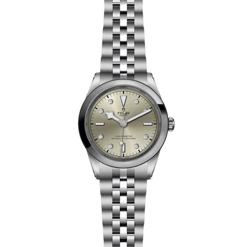 The TUDOR Black Bay One 41 is a unisex chic stainless steel watch with a silver dial, diamond hour markers, and a five-link bracelet—capturing the elegance of Black Bay models—presented against a white background.