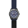 The TUDOR Pelagos FXD Chrono is a blue wristwatch inspired by the French Navy, with a chronograph dial, white markers, three subdials, date window, black rotating bezel, and blue fabric strap—ideal for underwater navigation.