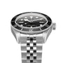 A TUDOR Black Bay watch in stainless steel with a black bezel, black dial, metal bracelet, and the time set to 10:10.