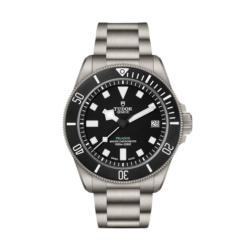 The TUDOR Pelagos Ultra is a stainless steel dive watch featuring a black bezel and dial, white markers, and a date window at 3 o’clock.