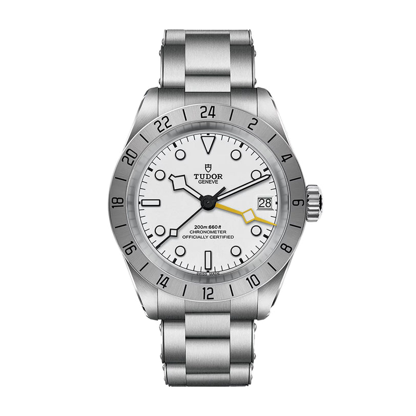 A TUDOR Black Bay Pro wristwatch with a white dial, date display, and silver bracelet shown on a white background.