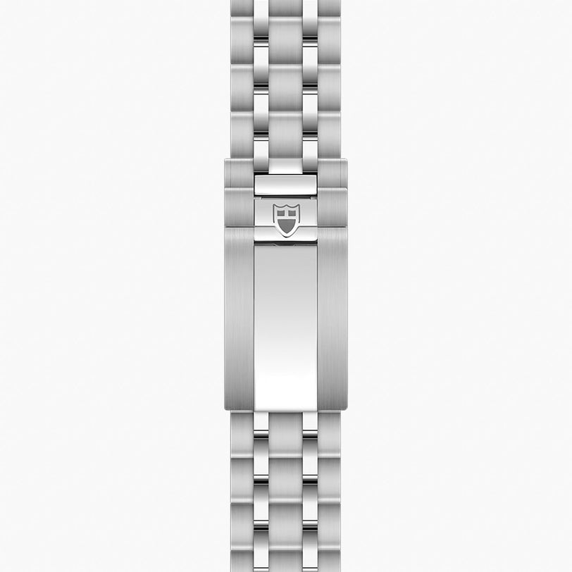 Stainless steel watch bracelet with linked segments and shield logo on center clasp.