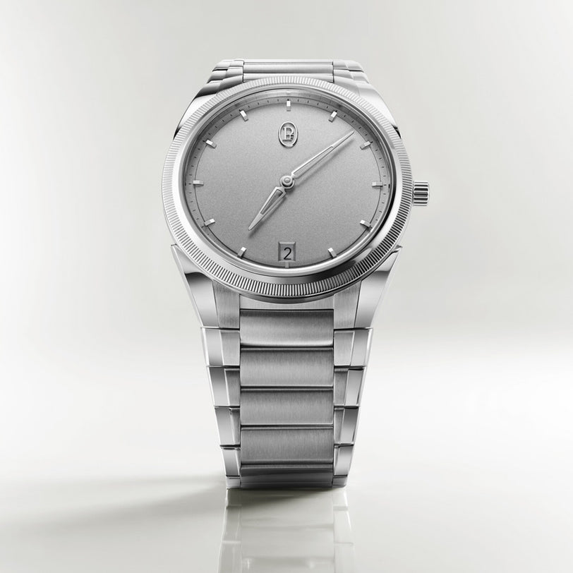 The Parmigiani Fleurier TONDA PF Micro-Rotor is a silver luxury wristwatch featuring a minimalist design, metal bracelet, and round face, displayed on a plain background.