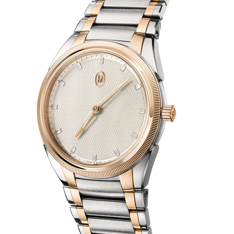 The Parmigiani Fleurier TONDA PF Automatic is a two-tone wristwatch with a gold bezel, silver and gold metal band, and a simple cream dial.
