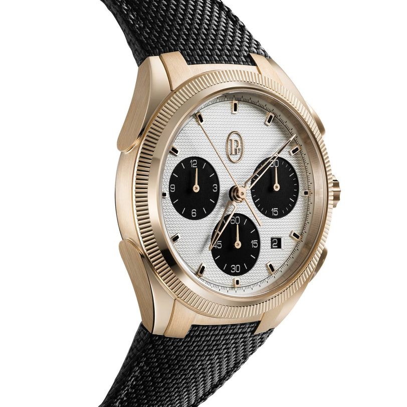 The Parmigiani Fleurier TONDA PF Sport Chronograph is a gold luxury wristwatch with a black woven strap, white dial, three black subdials, and a date window.