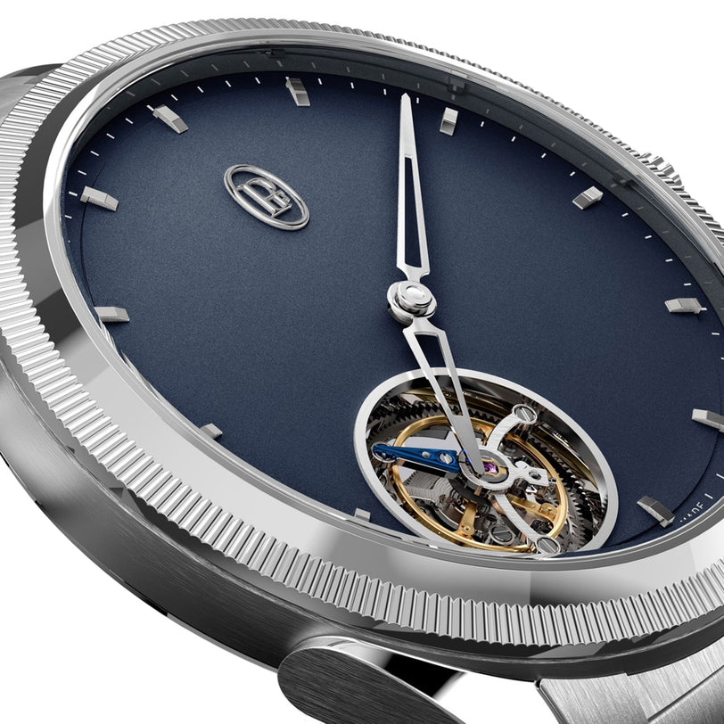 Close-up of the Parmigiani Fleurier TONDA PF Flying Tourbillon luxury wristwatch featuring a blue dial and a visible tourbillon mechanism at 6 o’clock.