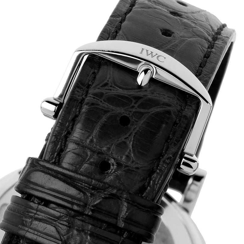 Close-up of a black leather strap with silver IWC engraving on the elegant IWC Schaffhausen Portofino Hand-Wound Eight Days watch.