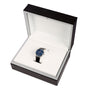 An IWC Schaffhausen Portofino Hand-Wound Eight Days watch, featuring a blue dial and black strap, is displayed inside an open white and black presentation box.