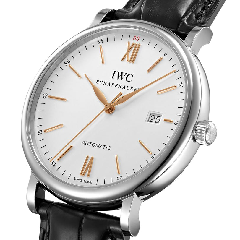 The IWC Schaffhausen Portofino Automatic features a silver case, white dial, gold markers, black leather strap, and date display at 3 o’clock.