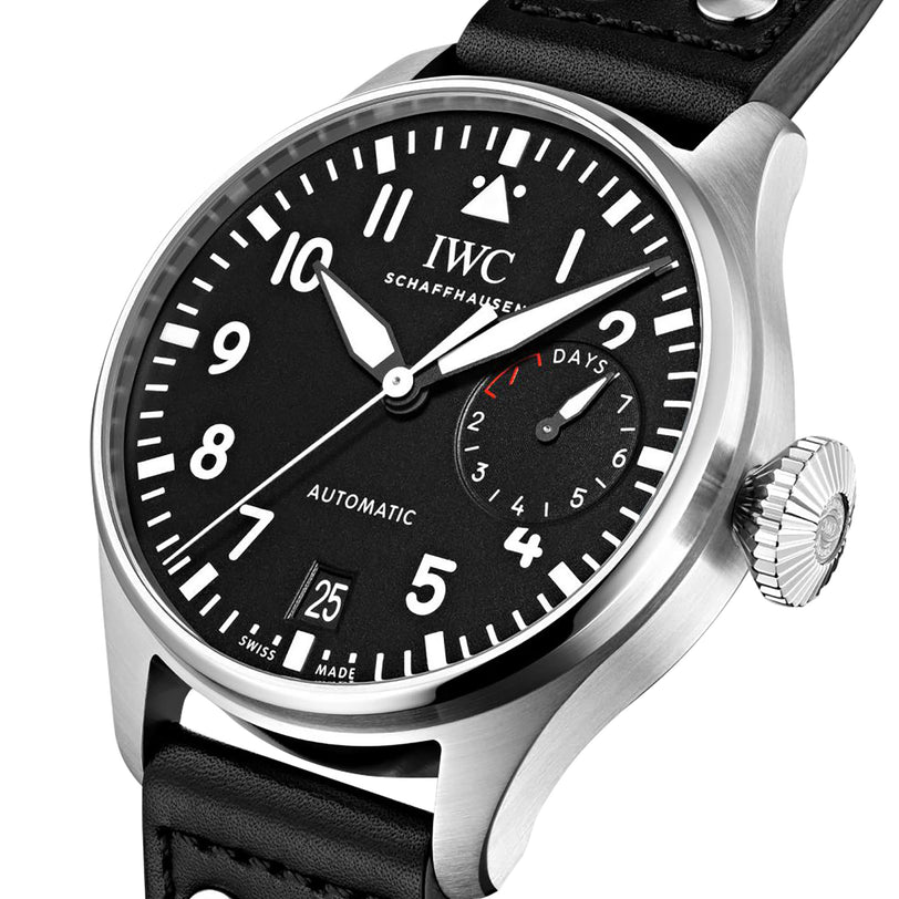 Close-up of the IWC Schaffhausen Big Pilots Watch, featuring a black dial with white numerals, date window, 7-day power reserve indicator, and a black leather strap.