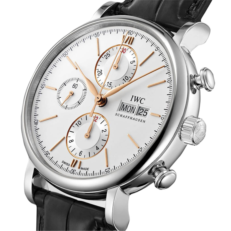 The IWC Schaffhausen Portofino Chronograph features a stainless steel case, white dial with gold markers and hands, three chronograph subdials, day-date display, and a black leather strap.