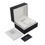 Black and white IWC Schaffhausen Portofino Hand-Wound Eight Days watch box with open lid, a white booklet, and a black IWC warranty card placed beside it on a white background—ideal for displaying your luxury timepiece.