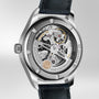Close-up of the back of the Portugieser Automatic 40 by IWC Schaffhausen, highlighting its intricately labeled movement components and sleek black leather strap.