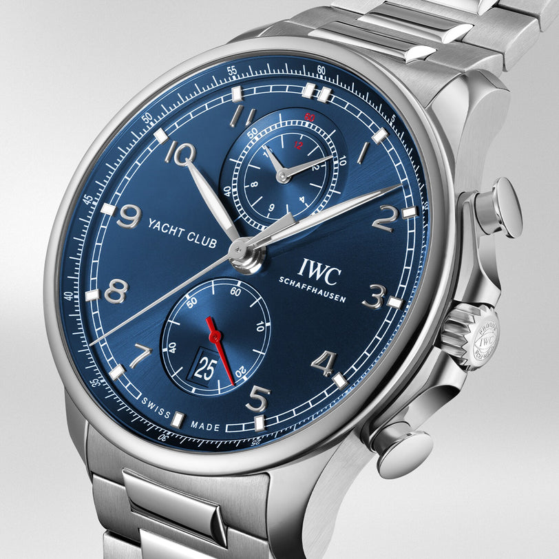 Close-up of the IWC Schaffhausen Portugieser Yacht Club Chronograph, featuring a blue dial, silver hands, date display, chronograph subdials, and an IWC 89361 calibre—an iconic nautical sports watch.