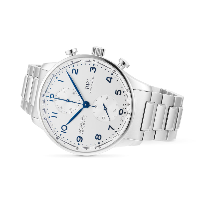 The IWC Schaffhausen Portugieser Chronograph wristwatch, featuring a white dial, blue numerals, and a stainless steel bracelet, is displayed at an angle on a white background.