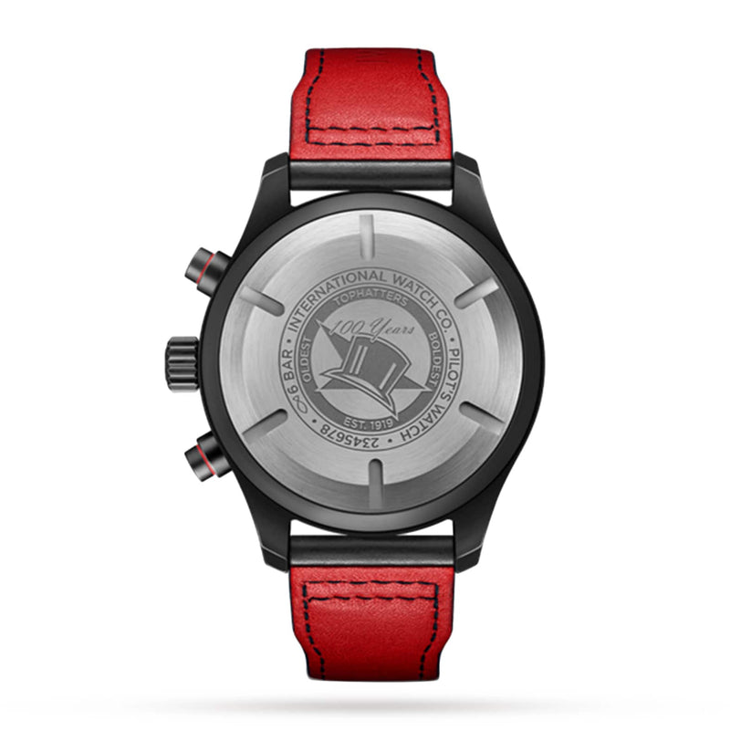 The IWC Schaffhausen Pilots Watch Chronograph Edition Tophatters features a black ceramic case, red leather strap, and an engraved commemorative backplate in the iconic pilot’s watch style.