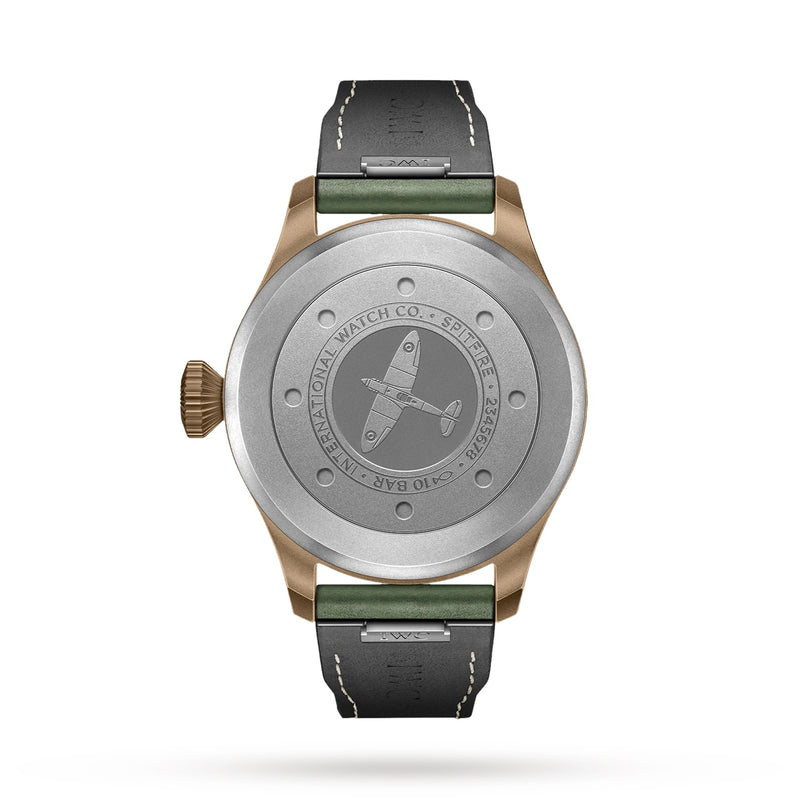 A close-up of the back of the IWC Schaffhausen Big Pilots Watch 43 Spitfire shows a Spitfire engraving, “International Watch Co. Spitfire” inscription, a green and black leather strap, and the EasX-CHANGE system.