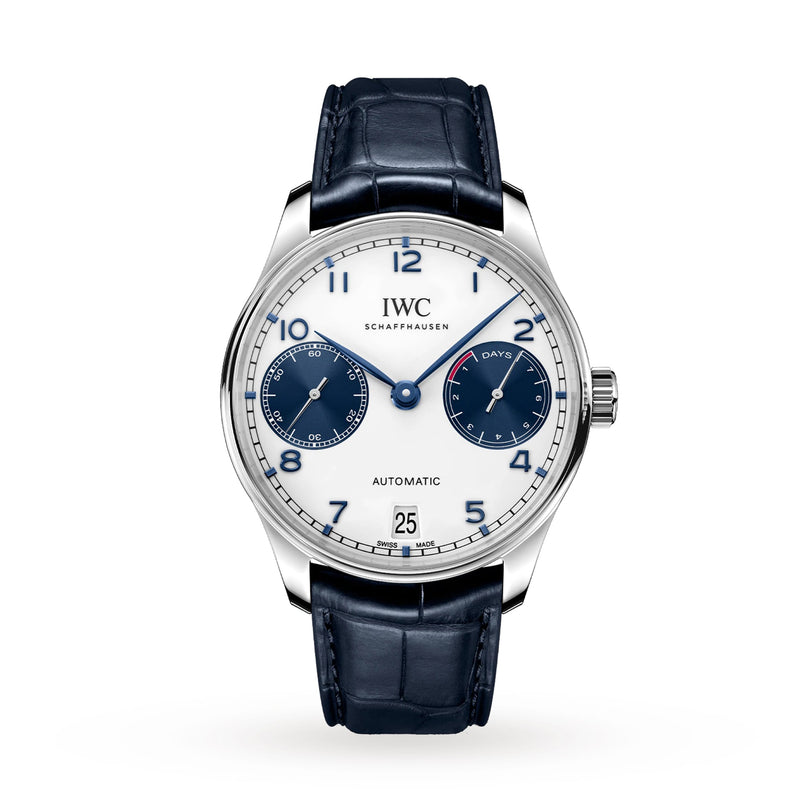 An IWC Schaffhausen Portugieser Automatic watch with a silver case, white dial, blue hour markers, two subdials, date at 6 o’clock, and a black alligator leather strap.