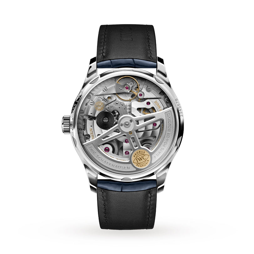 Close-up of the IWC Schaffhausen Portugieser Automatic’s back, showcasing its 52010 calibre movement with visible gears and intricate parts, paired with an elegant black alligator leather strap.