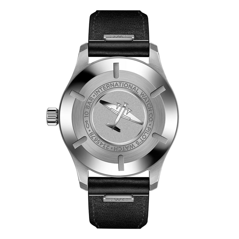 Back view of the IWC Schaffhausen Pilot’s Watch Mark XX, featuring a silver case with an engraved airplane design and a black leather strap.