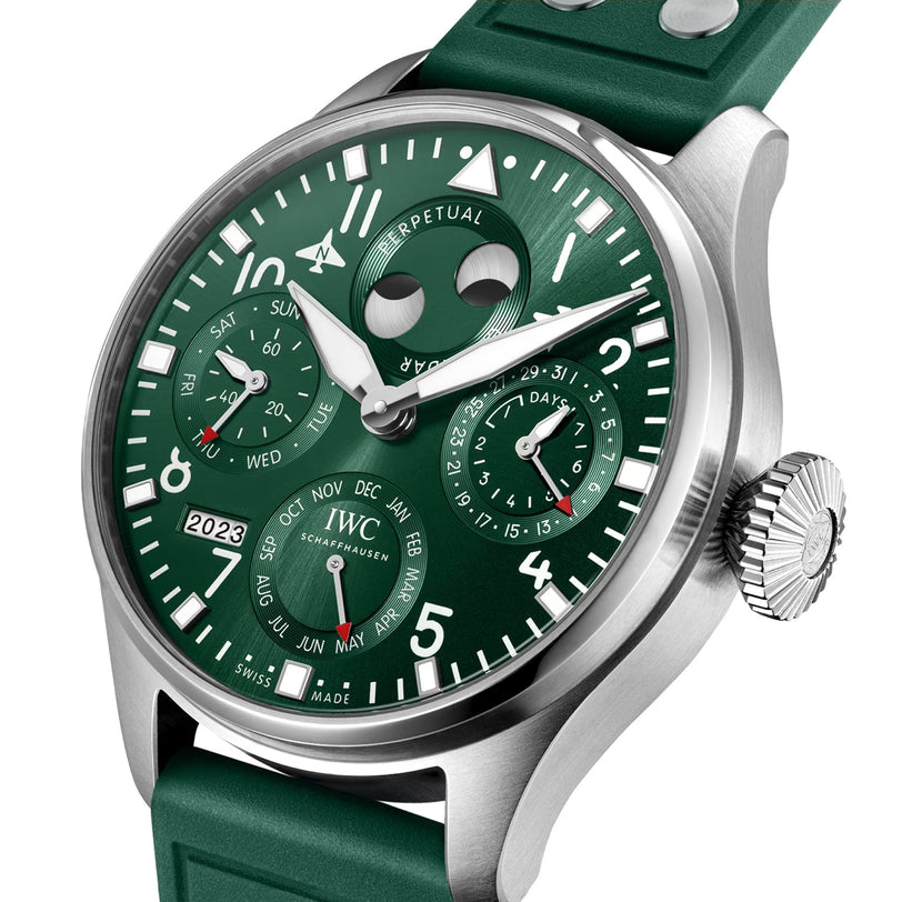 The IWC Schaffhausen Big Pilots Watch Perpetual Calendar features a stainless steel case, green dial, moon phase, full calendar display, IWC 52616 calibre movement, and a matching green rubber strap.
